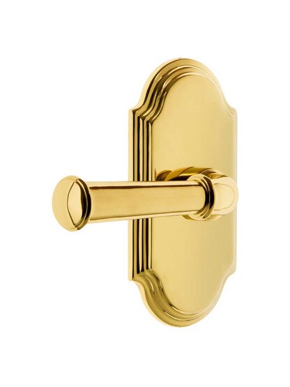 Grandeur Arc Rosette Door Set with Georgetown Levers in Polished Brass.